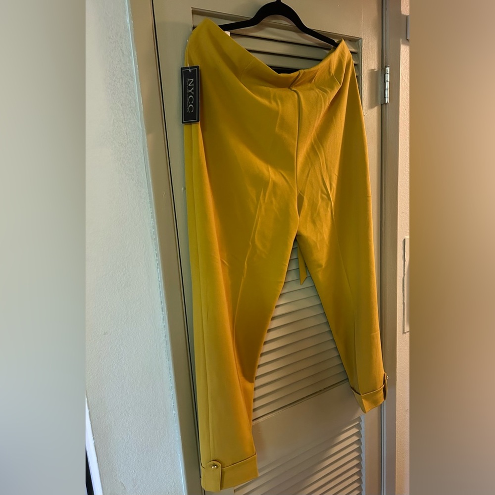 Mustard colored dress pants.